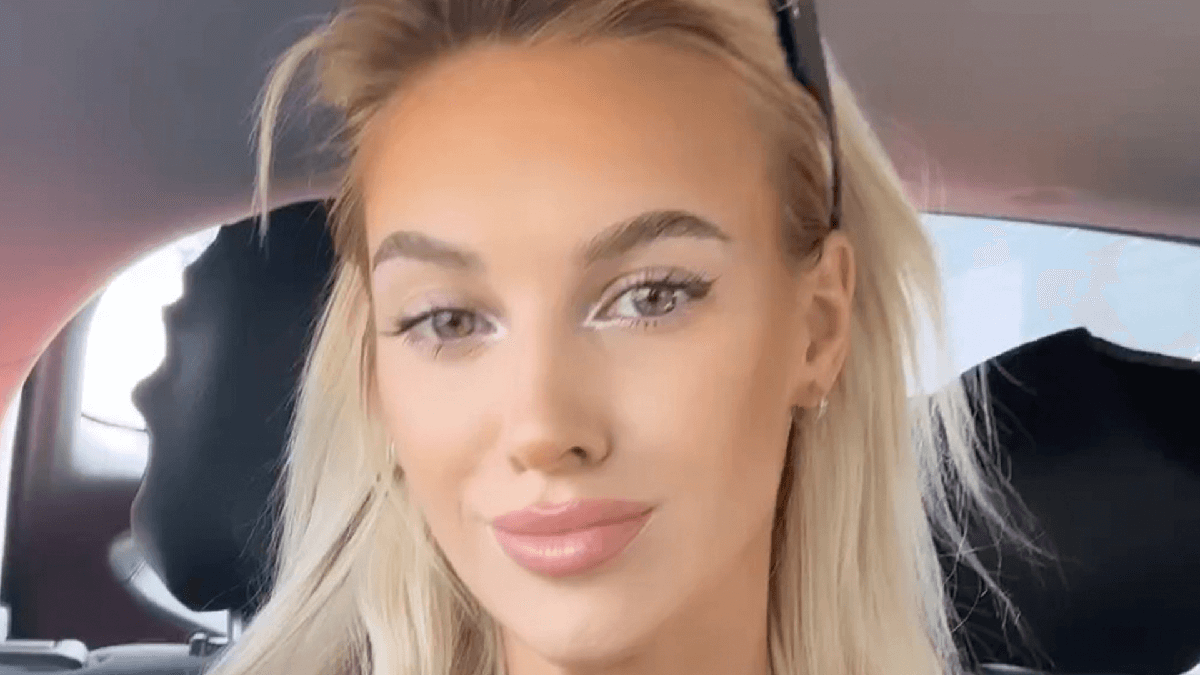 The stunning Veronika Rajek goes braless nearly bursts out of top in the backseat of a car